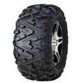 Atv Dekk 30x10R14 Duro DI2039 Power Grip V2, skråvisning som fremhever brede spor og sølvfelg mot hvit bakgrunn.