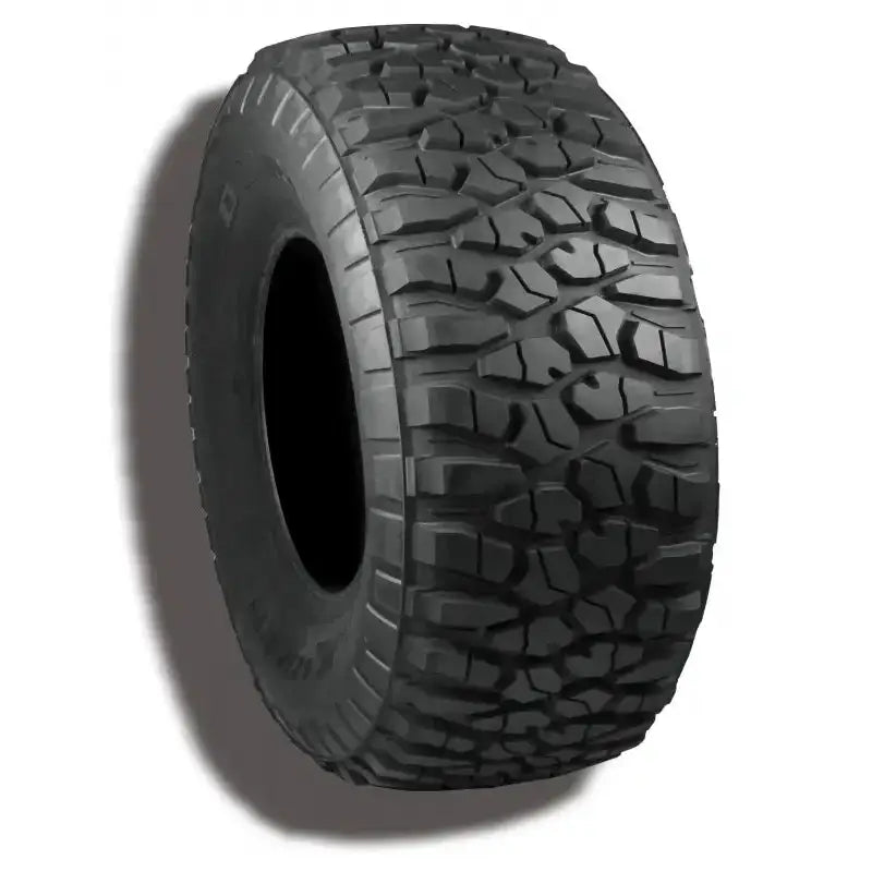 Atv Dekk 29x10R15 Duro DI2042 Power Grip M/T, skråvisning som fremhever det grove mønsteret for optimalt terrenggrep.