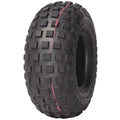 Atv Dekk Duro HF-240 Knobby, vist i trekvart vinkel med rød stripe midt på slitebanen.