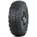 Atv Dekk 29x11-14 ITP UltraCross i trekvart vinkel, viser grovt mønster, metallfelg og blå detaljer ved navet.