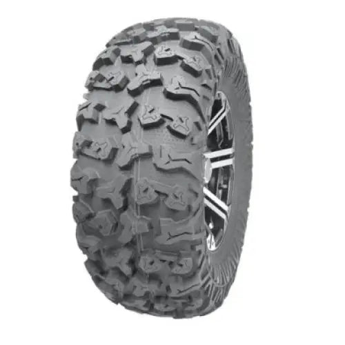 Atv Dekk 28x10R14 Journey, skrått bilde som fremhever store knaster i slitebanen og markert sidevegg.