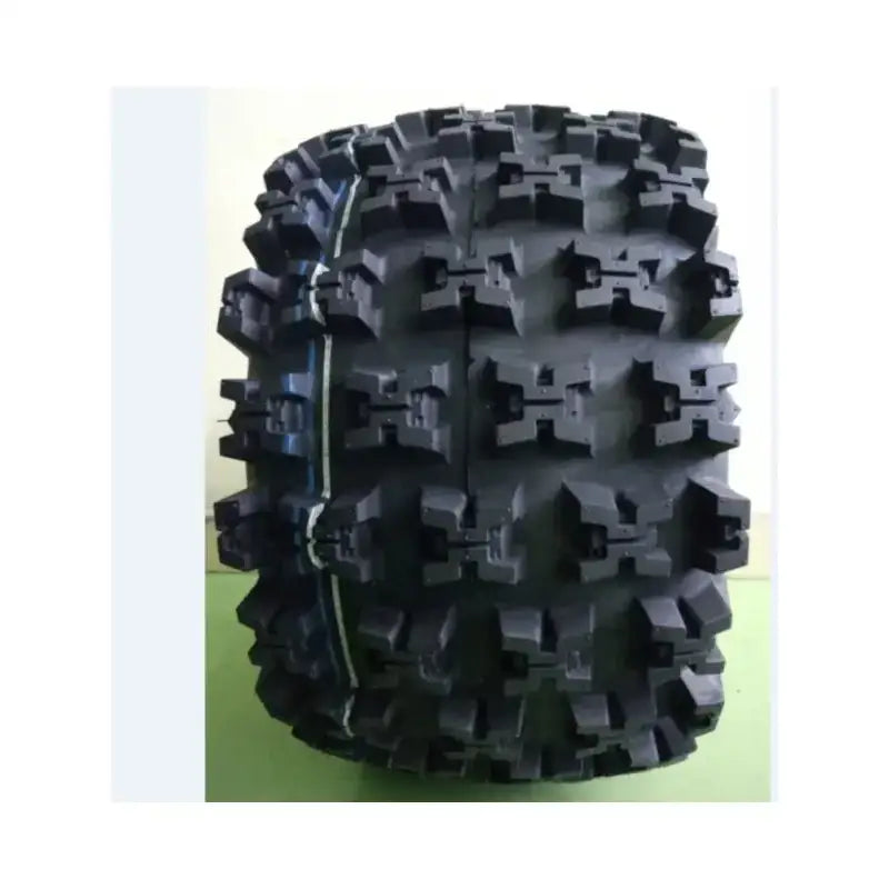 Atv Dekk 22x11-9 Journey, frontvisning med dype terrengknaster og tydelig grovmønstret slitebane mot lys bakgrunn.