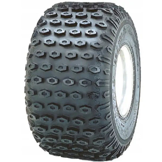 Atv Dekk 18x9.50 Kenda K290 sett på skrå, viser sekskantede knaster i slitebanen og tydelig sidevegg.