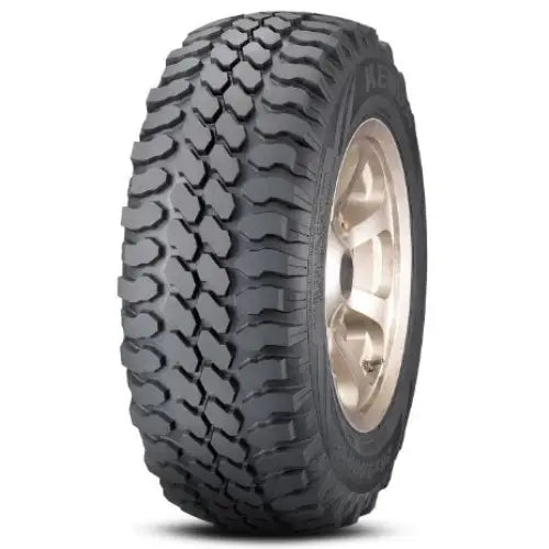 Atv Dekk 30x10R14 Kenda K576, trekvart vinkel som fremhever grovt mønster og sølvfarget felg.