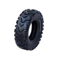 Atv Dekk 24x8-12 Roadguider Apollo, sidevisning som fremhever grove knaster og slitesterkt terrengmønster.