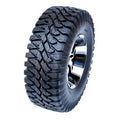 Atv Dekk 32x10-14 Roadguider Ohanzee A/T, skråvisning som fremhever grove knotter og blank metallfelg.