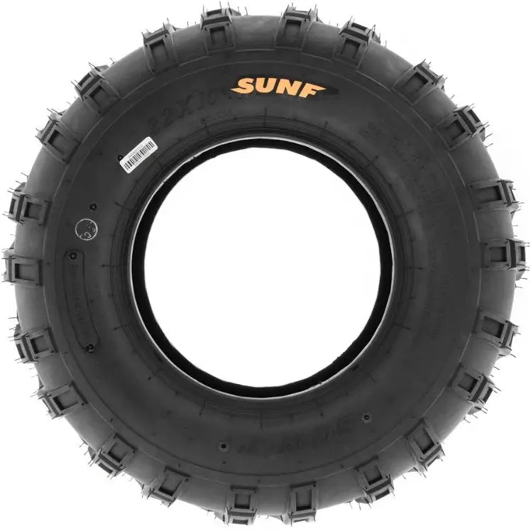 Atv Dekk 23x7-10 Sunf A028 sett forfra, viser markant mønster og gul SUNF-logo på dekksiden.